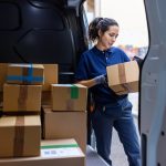 worker-checks-parcels-in-a-delivery-truck-getty-images